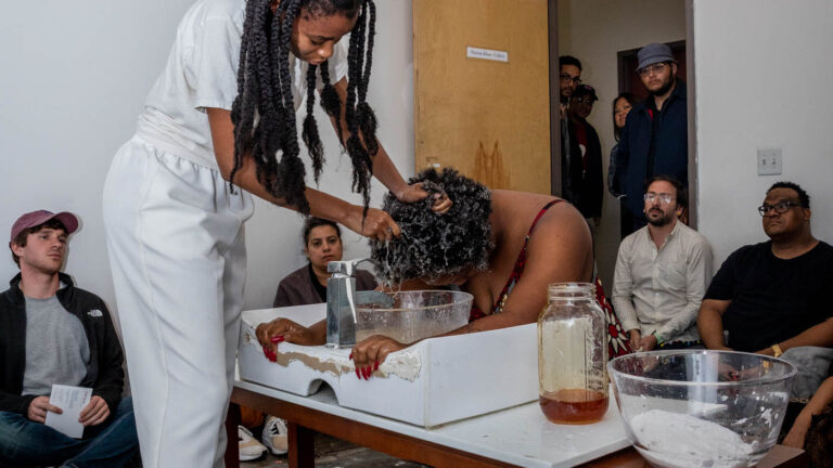 Performance art happening in a small room